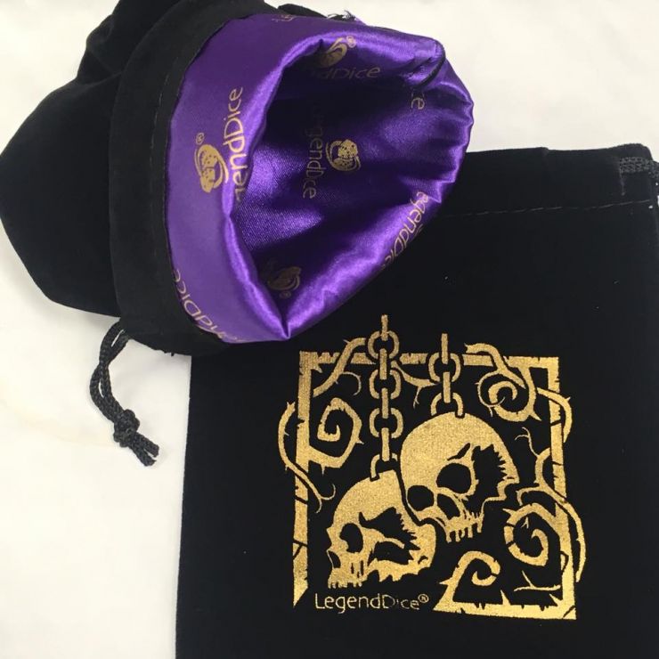 LegendDice chained skulls dice bag with gold print showing inner lining in purple